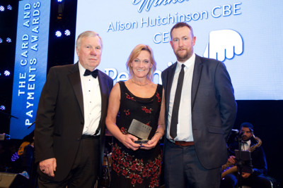 Alison accepts her award on stage, alongside host, comedian Alex Horne.