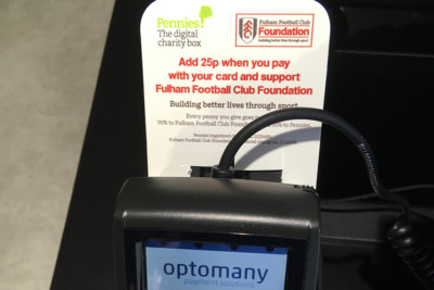 Fulham Football Club payment terminal is shown, with a point of sale card attachment depicting how to donate to Fulham FC Foundation, with Pennies